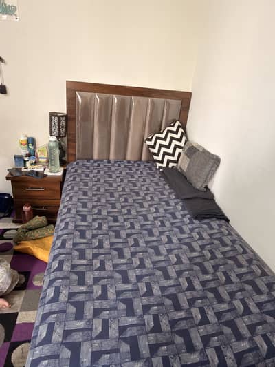 single bed with side table without mattress