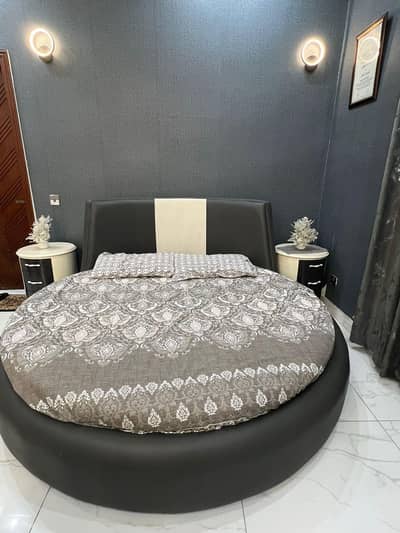 round bed and side tables
