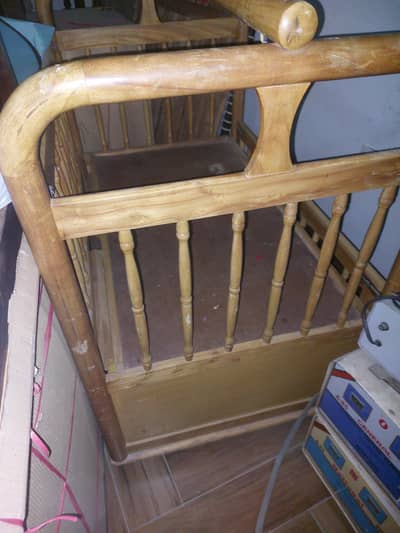 baby wooden cot with swing and drawers