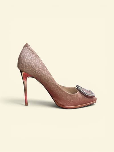 Stiletto heels with rhinestone buckle
