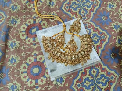 Brand new bridal artificial jewelry set- golden color