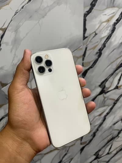 Iphone 12 pro 128 GB jv sim 99 health with less than 100 charge cycle