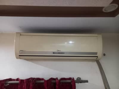 Orient Midea 1.5 ton 10/10 condition