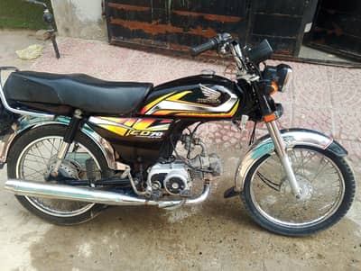 Honda 70 black color good condition ha