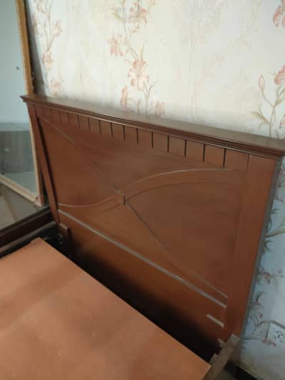 single wooden Bed