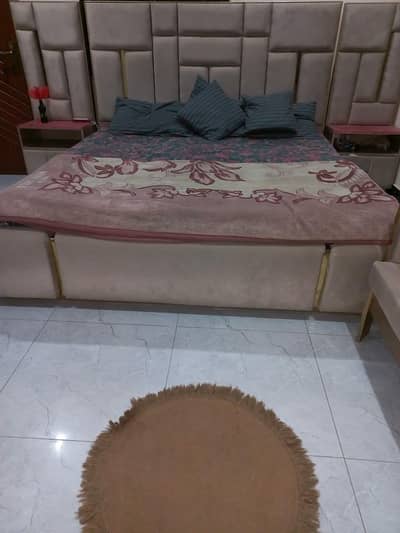 King Bed  side drawer and dressing table and puffy sofa.