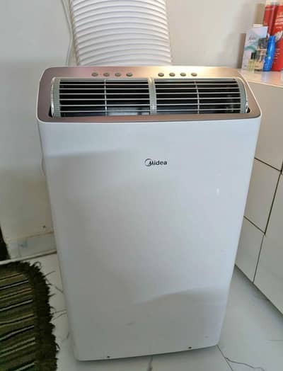 Midea Portable AC 1.25 ton brand New condition with remote control