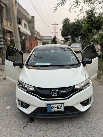 HONDA FIT AVAILABLE 50 percent Touching