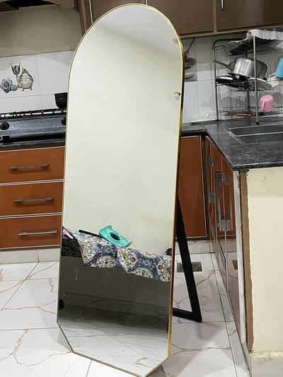 Stand mirror for sale. Good condition, stylish look, slightly used.