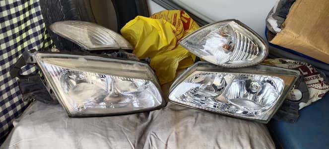 Nissan Sunny 2005-2012 Genuine Headlights-Japan