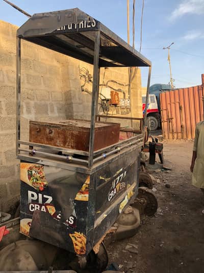 food stall with hot plate and fries machine