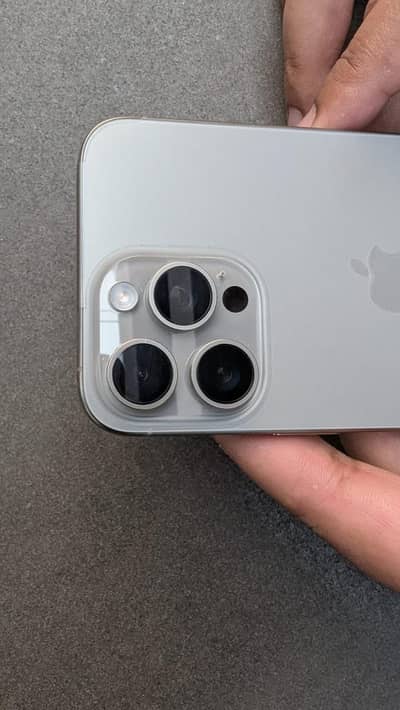 15 pro max natural titanium with original charger and box