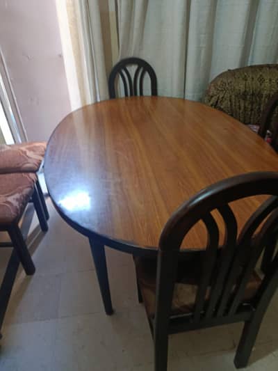 Dining Table Oval shape with 6 chairs, Good Condition
