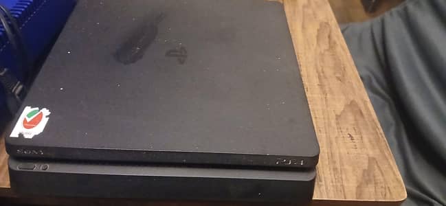 old ps4 slim with 5 games and 2 copy controller