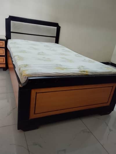sale my home use   one. single bed with side table without mattress