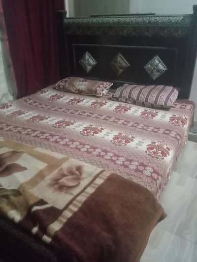 Bed with dressing table and mirror