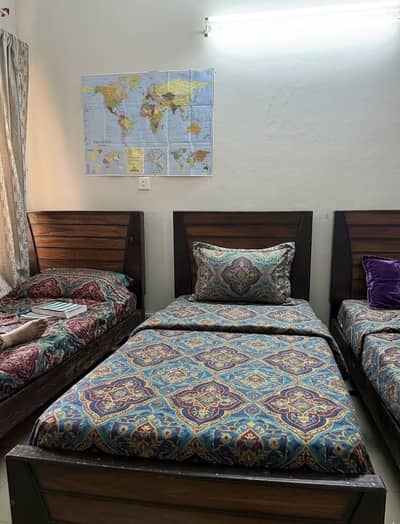 2 Single beds one with mattress in pretty condition