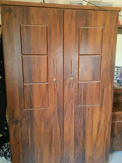 heavy wooden wardrobe neat n clean