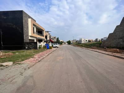 E Block 10 Marla Residential Plot no 1227 street 36 With Possession Utility Charges Paid Near To Market and School Available For Sale