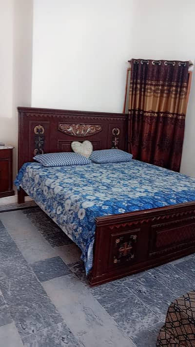king size bed with side tables and dressing