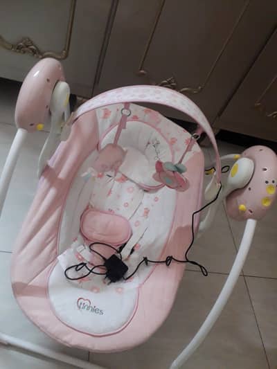 tinnies baby swing ( pink colour)