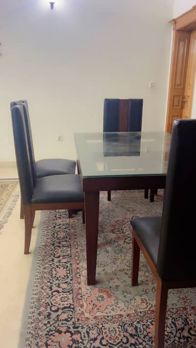 Rosewood Dinning Table for sale.