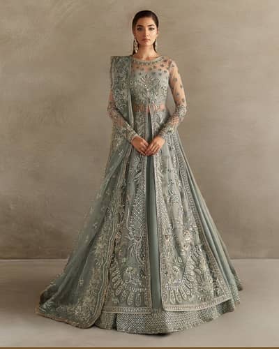 Heavy Embroidered Mint Green Bridal Gown by Akbar Aslam