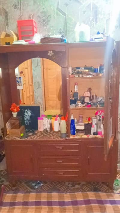 Elegant wooden dressing table with mirror and storage