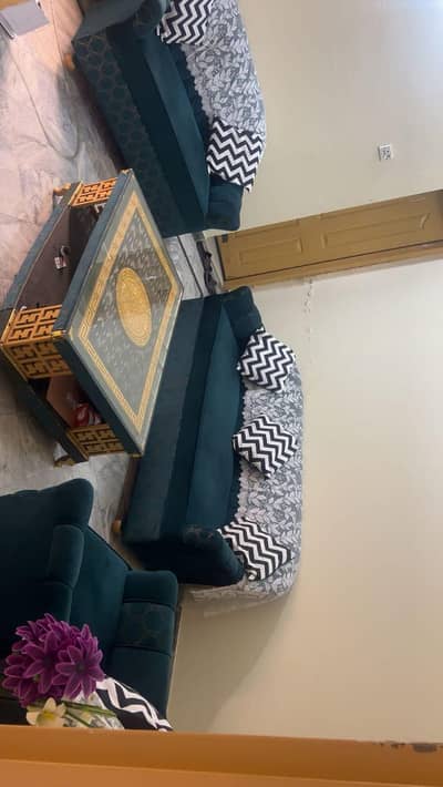 Urgent sale 7 seater sofa with table