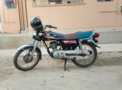 black color Honda 125 2006 model