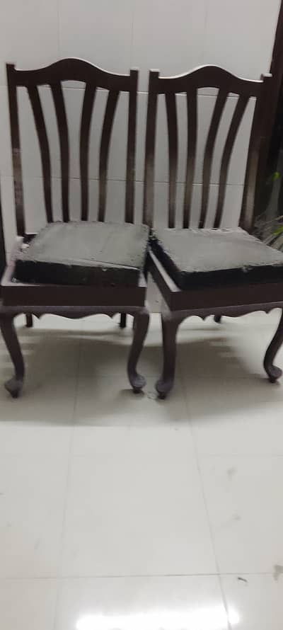 Selling wooden dining table with 6 chairs