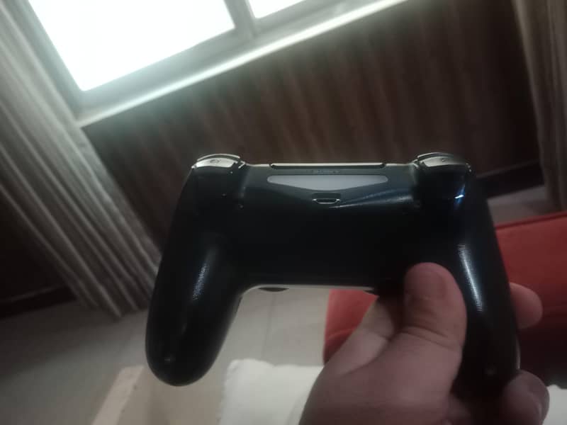 Two used PS4 controllers. 2