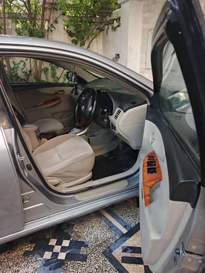 Corolla 1.6 gli auto 2013 ahad Khan 03235591639
