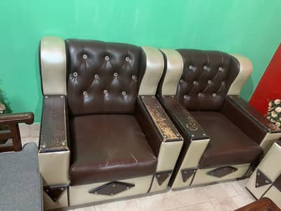 Wooden sofa set in used condition with small size setti.