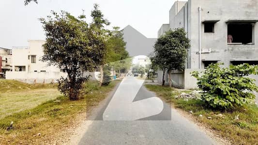 5 Marla Plot No- 693/5 Block D Top Location of Phase 9 Town DHA Lahore For Urgent Sale