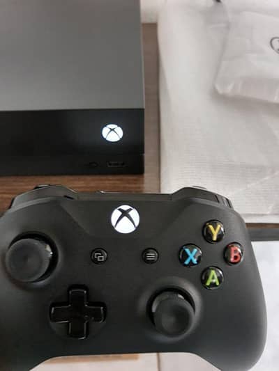 xbox one x with 2 controller