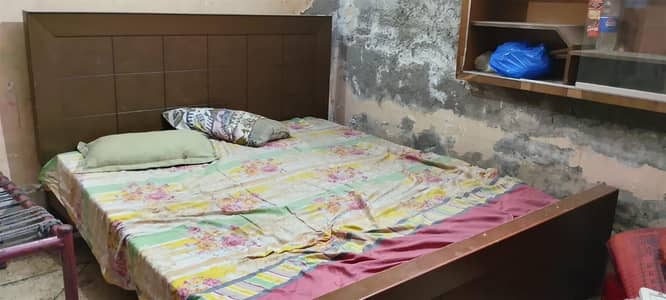 Double bed and side table
