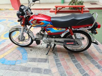 Honda cd 70 Red color 2025/2026 modal