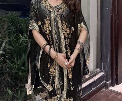 Black and golden fancy dress for wedding occasion