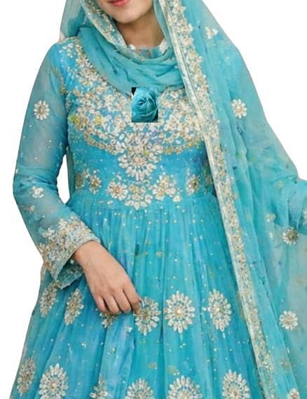یہ ایک فیروزی ،/   خوبصورت ایکوا بلیو کلر ہے ۔انارکلی فراک ہےک 0