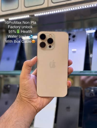 iPhone 14 Pro Max with capable and charger