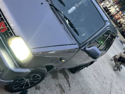 Automatic Mehran with power windows and power staring with smooth driv