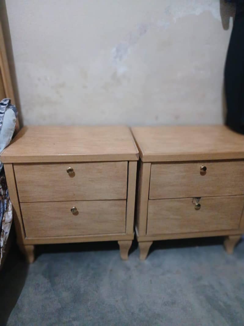 bed and side table with dressing 1