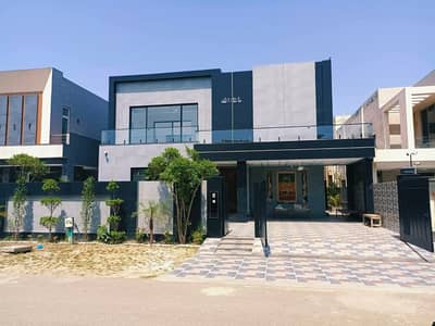 1 KANAL ELEGANT AND FULLY MAINTAINED SUPER HOT LOCATED MODERN BUNGALOW IS AVAILABLE IN THE BEST BLOCK OF DHA LAHORE.