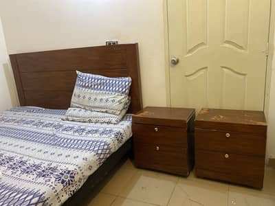 Trendy King size wooden bed with side tables