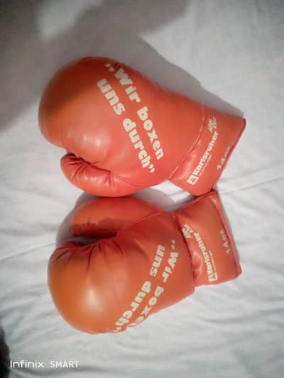 Paffen Sport Orignal Boxing gloves of 8oz with pair of hand tapping.