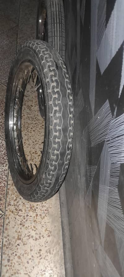honda 125 genuine rims or servies tyers