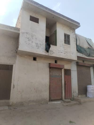 دکان بمعہ فلیٹ برائے فروخت کرایہ 15 ہزار بہترین انویسٹمنٹ
