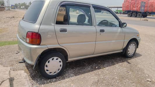 Daihatsu Coure CX Eco 2010