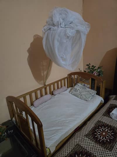 Baby cot for sale Rs. 9,000